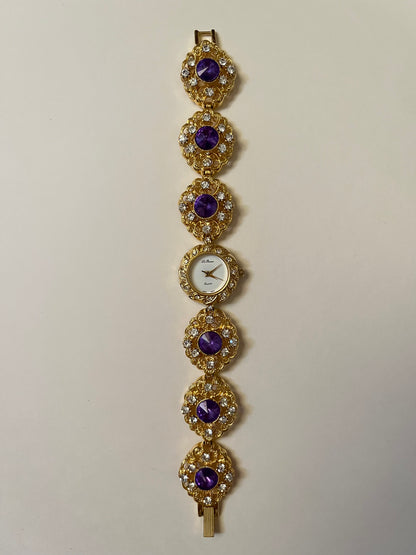 Extremely Rare and Breathtaking Gold Tone Watch with Ornate Band Design and Purple and Pink Stones Accent