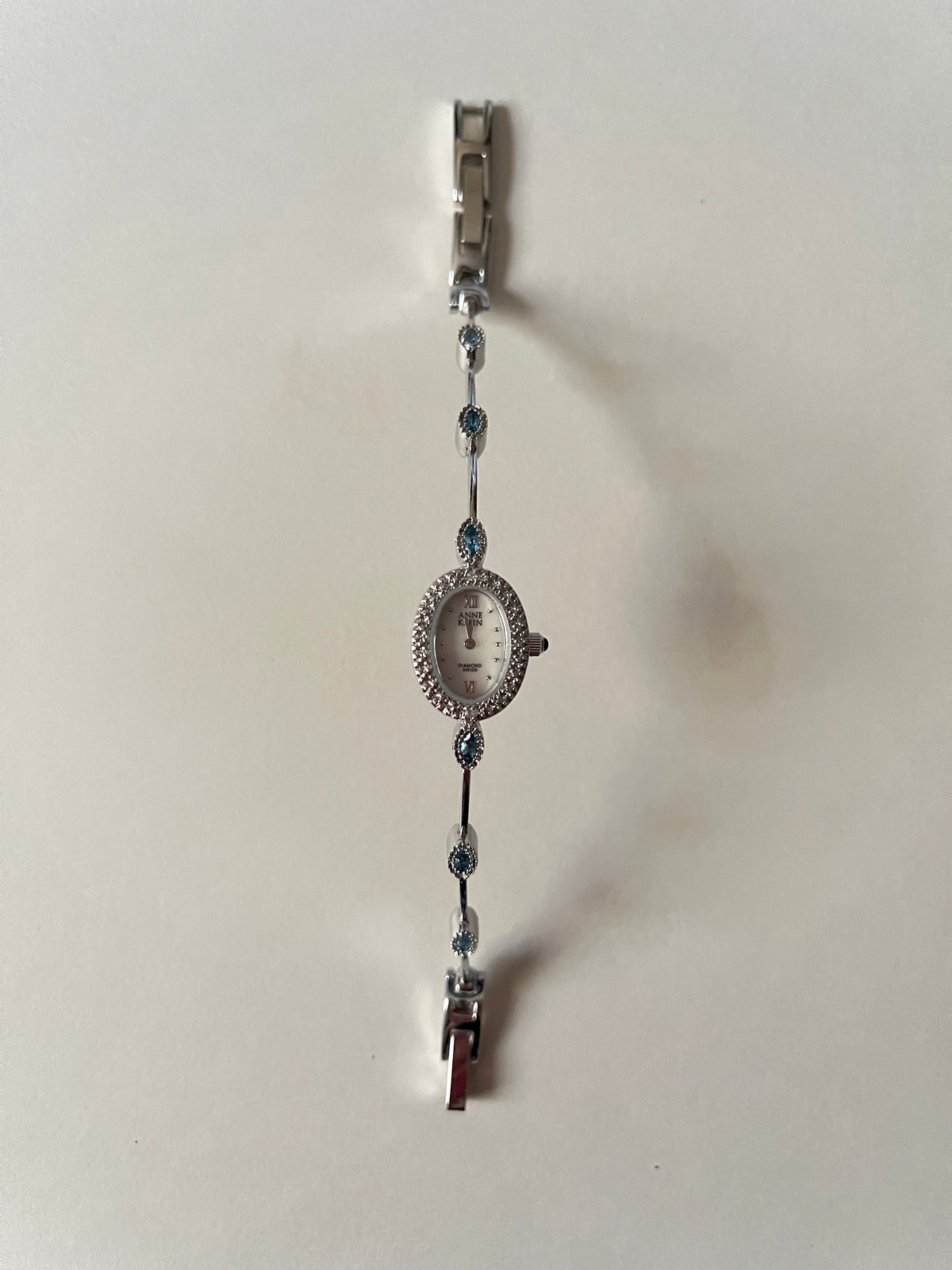 Very Dainty Silver Tone Swiss Watch with Real Diamonds and Light Blue Stones Accents