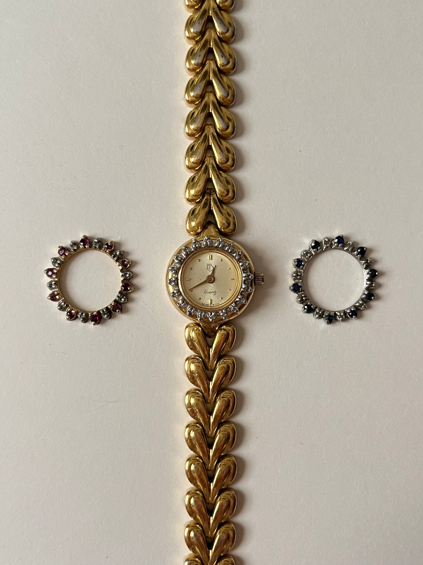 Beautiful Vintage Gold Tone Swiss Paul Breguette Watch with Interchangeable Rubies and Sapphires Inset Bezels