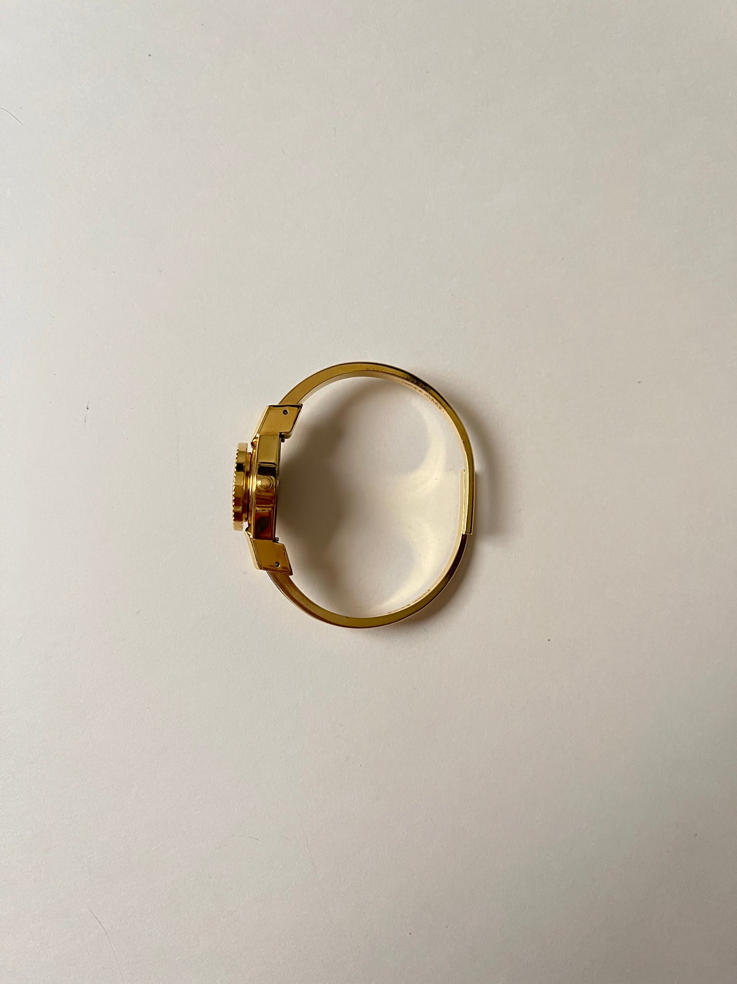 Beautiful Gold Tone Open Cuff Peekaboo Swiss Watch with Navy Blue Floral Enameled Bracelet