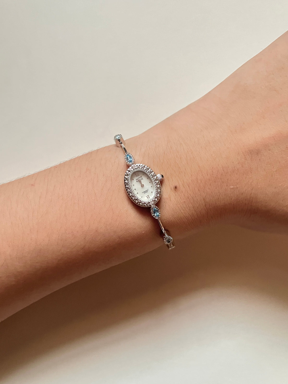Very Dainty Silver Tone Swiss Watch with Real Diamonds and Light Blue Stones Accents