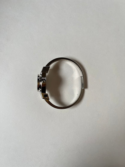 Beautiful Silver Tone Open Cuff Peekaboo Swiss Watch with Black Floral Enameled Bracelet