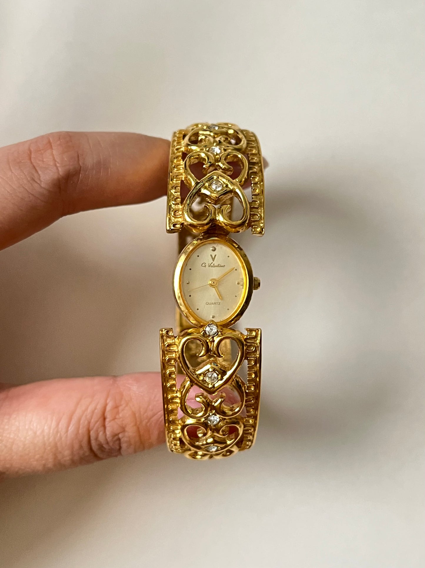 Very Gorgeous and Ornate Gold Tone Peekaboo Cuff Watch with Oval Dial