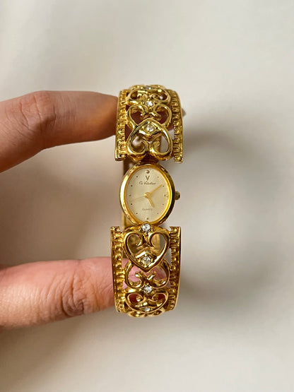 Very Gorgeous and Ornate Gold Tone Peekaboo Cuff Watch with Oval Dial