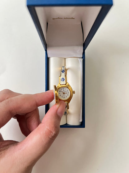 Beautiful Gold Tone Open Cuff Peekaboo Swiss Watch with Navy Floral Enameled Bracelet