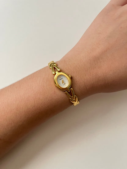 Absolutely Stunning Gold Tone Half Cuff Watch with Oval Dial