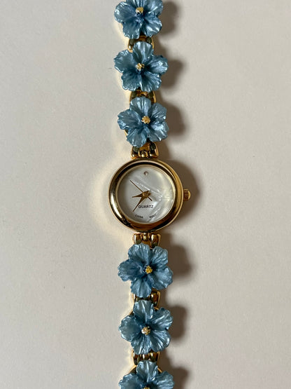 Adorable Gold Tone Watch with Round Dial and Blue Hibiscus Floral Links