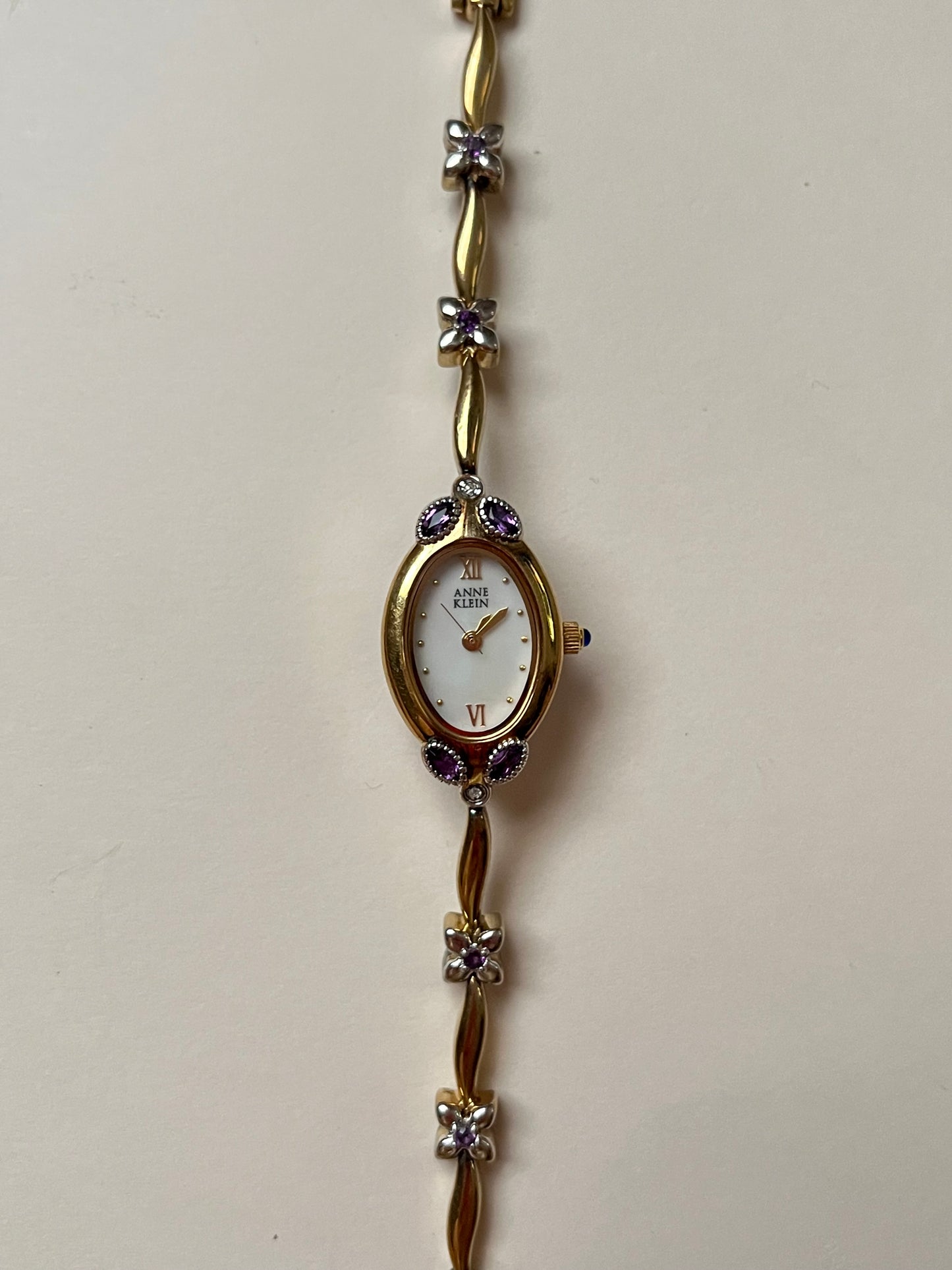 Gorgeous And Dainty Rare Gold Tone Anne Klein Watch with Purple Stones Accent