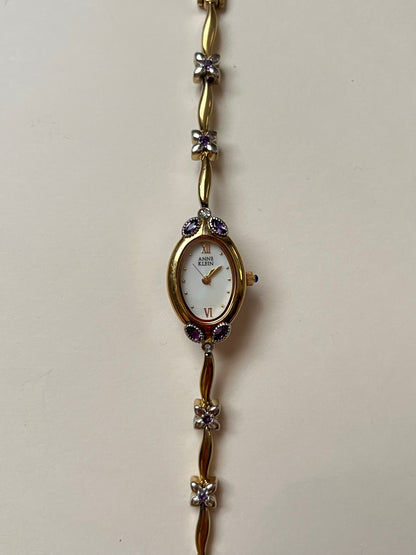 Gorgeous And Dainty Rare Gold Tone Anne Klein Watch with Purple Stones Accent