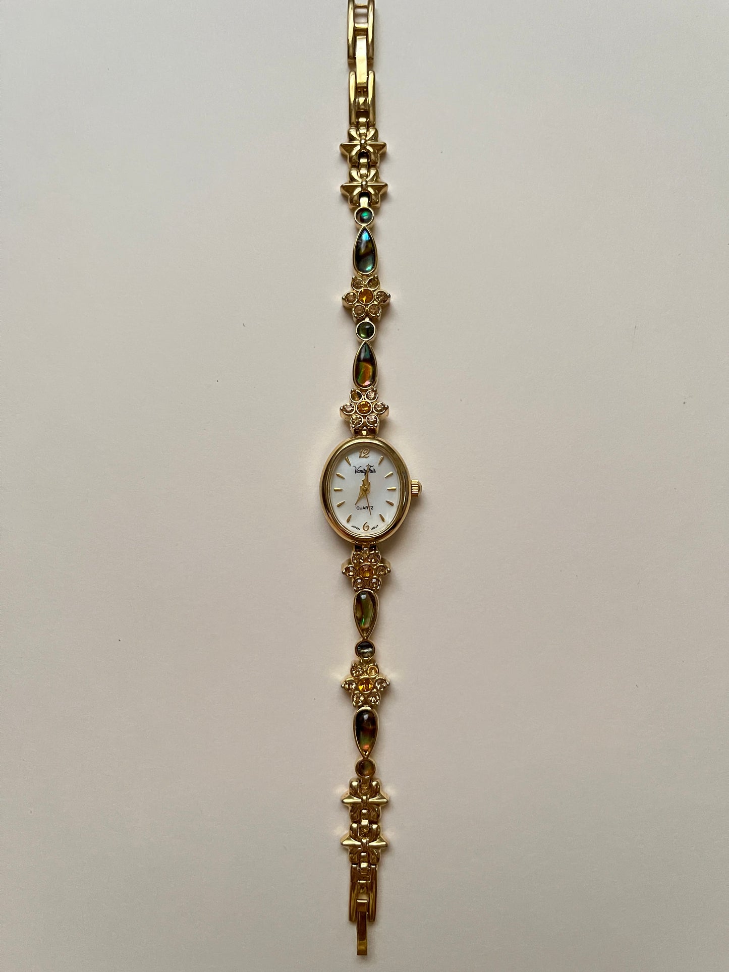 Beautiful and Dainty Gold Tone Watch with Abalone and Rhinestones Accents