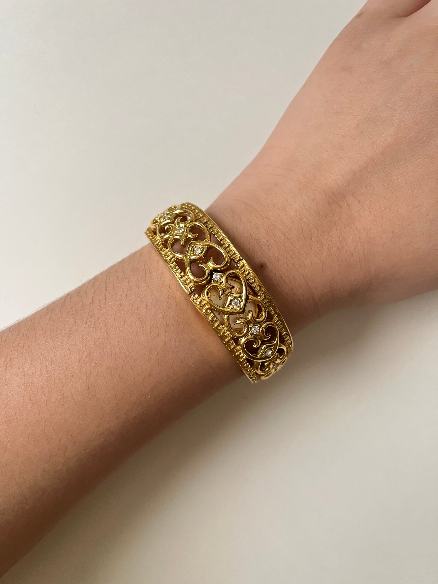 Very Gorgeous and Ornate Gold Tone Peekaboo Cuff Watch with Oval Dial