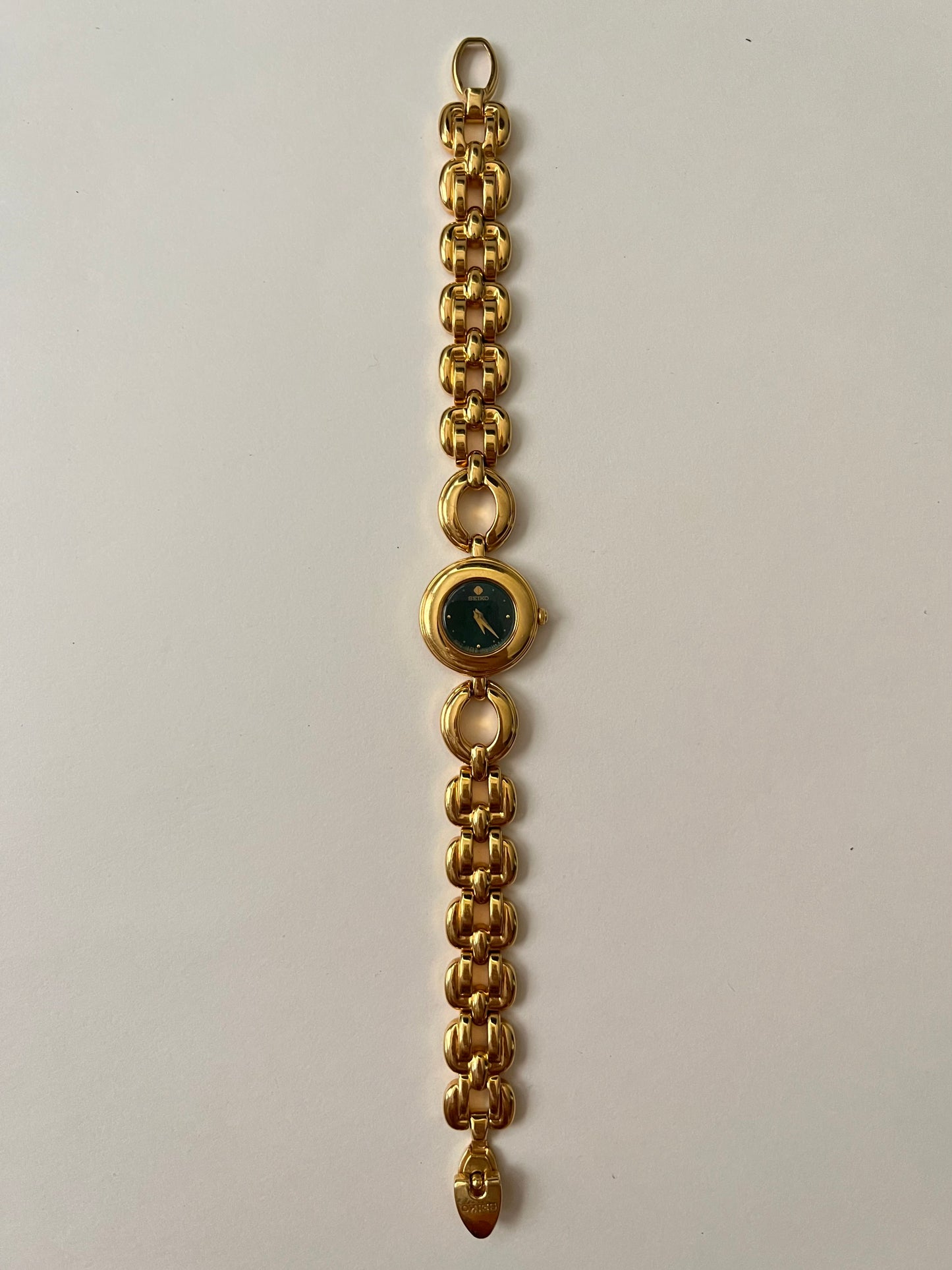 Extremely Rare and Beautiful Vintage Gold Tone Seiko Watch with Round Emerald Green Dial