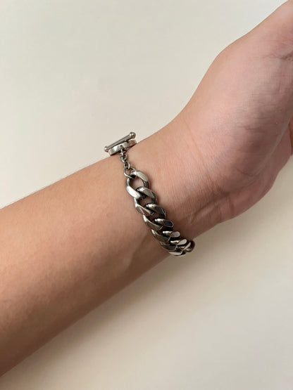 Rare Silver Tone Watch with Toggle Lock Closure and Blue Round Dial