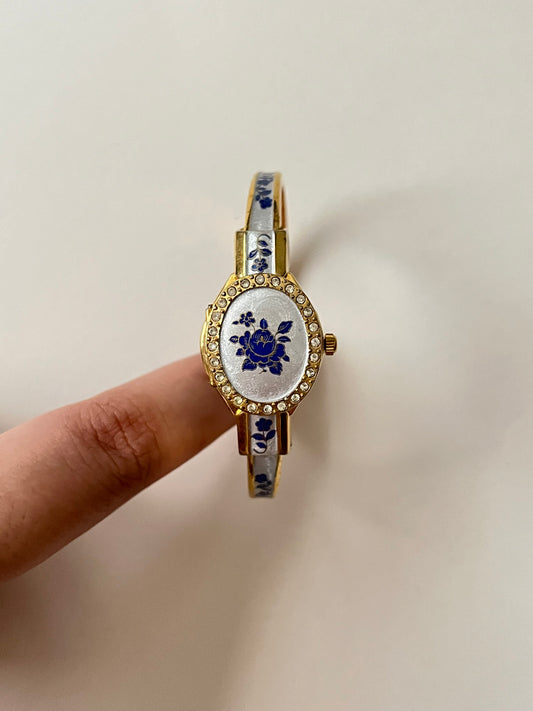 Beautiful Gold Tone Open Cuff Peekaboo Swiss Watch with Navy Floral Enameled Bracelet