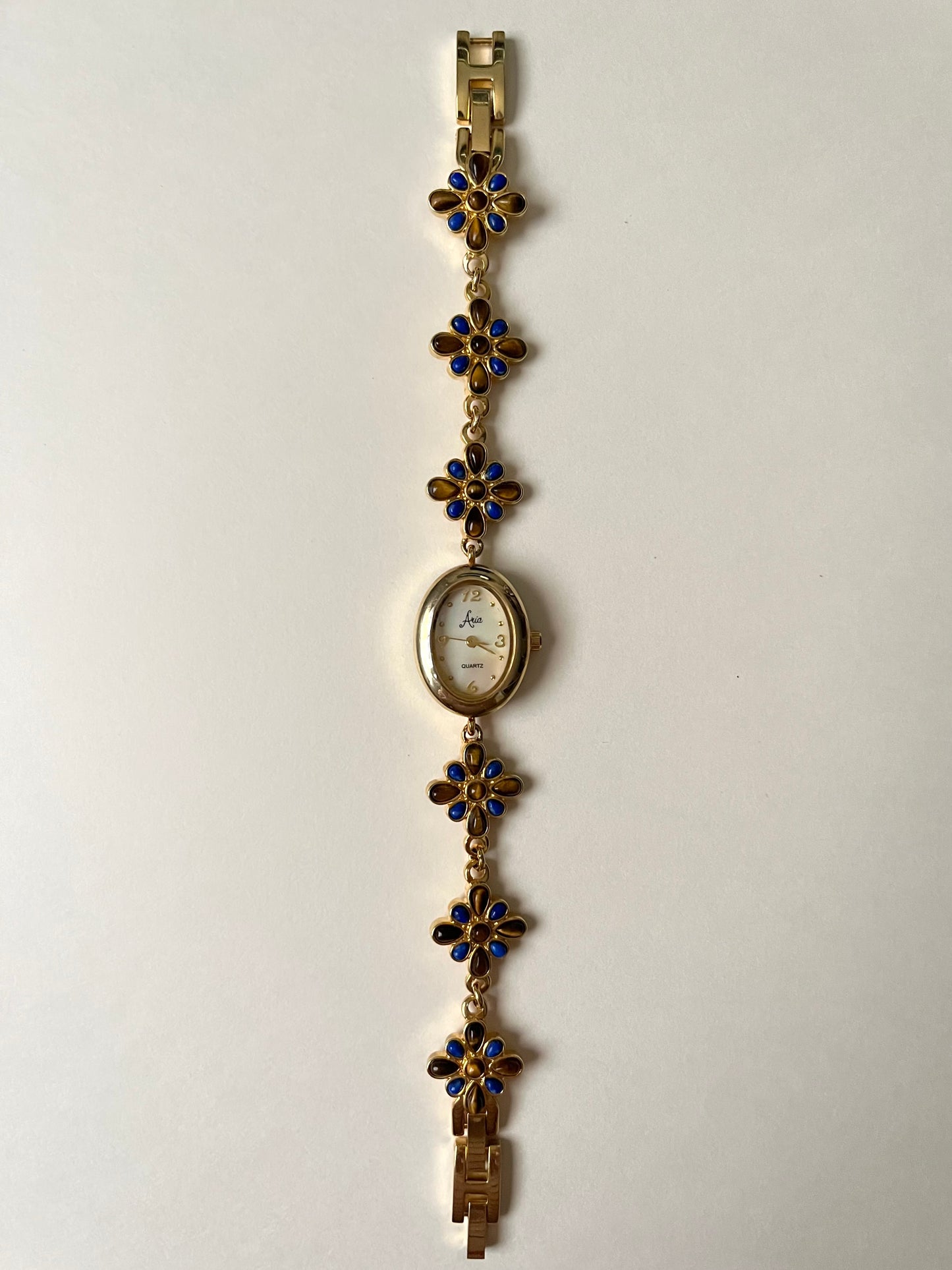 Adorable Gold Tone Watch with Lapis Lazuli and Tiger's Eye Stones Accent