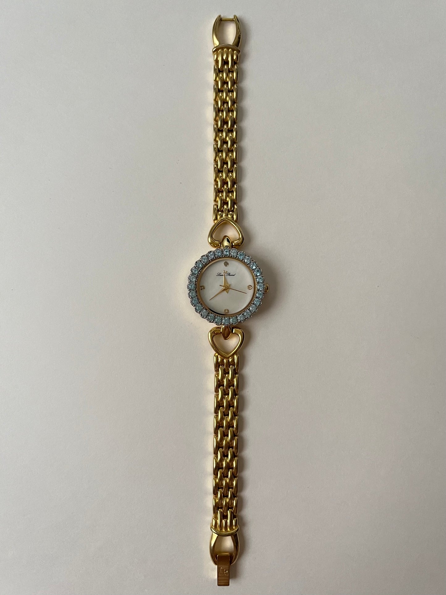 Stunning Gold Tone Watch with Blue Stones Bejeweled Round Dial