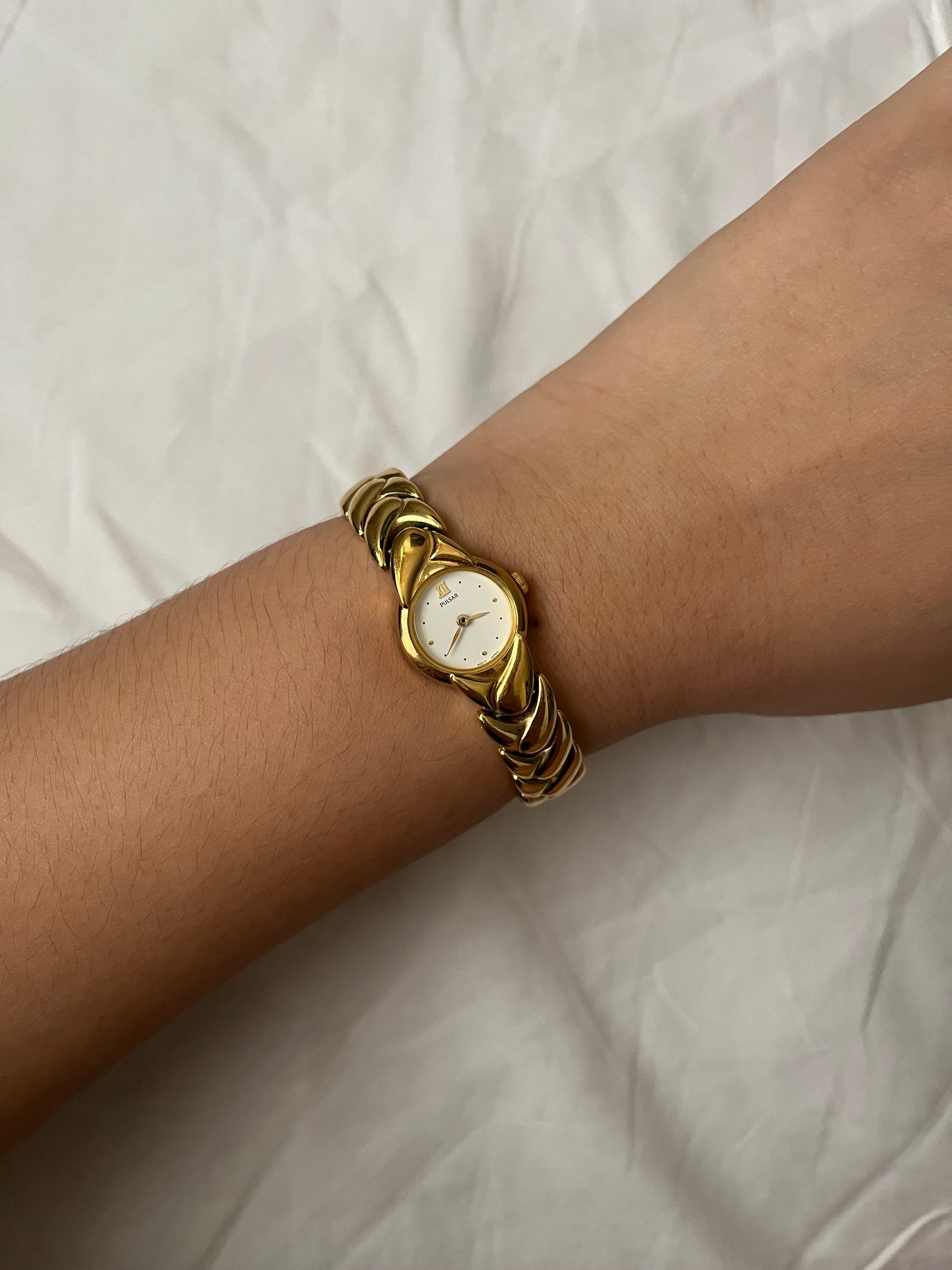 Beautiful Gold Tone Pulsar Watch with Braided Style Band