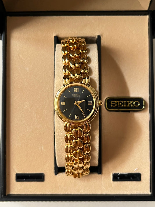 Classic and Elegant Gold Tone Seiko Watch with Black Round Dial