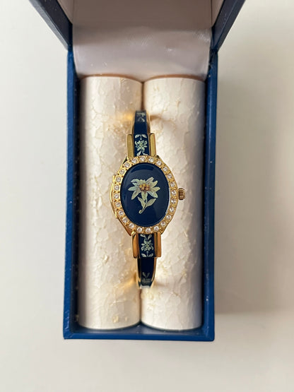 Beautiful Gold Tone Open Cuff Peekaboo Swiss Watch with Navy Floral Enameled Bracelet