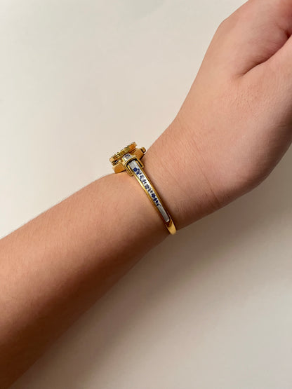 Beautiful Gold Tone Open Cuff Peekaboo Swiss Watch with Navy Floral Enameled Bracelet