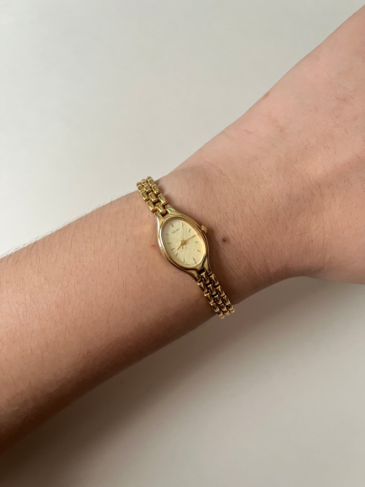 Lovely Dainty Gold Tone Seiko Watch with Oval Dial