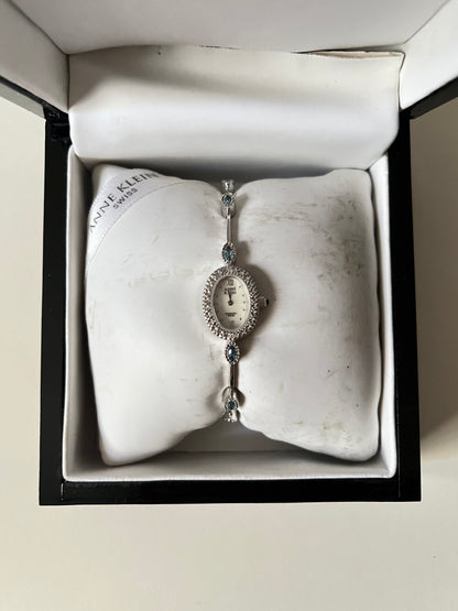 Very Dainty Silver Tone Swiss Watch with Real Diamonds and Light Blue Stones Accents