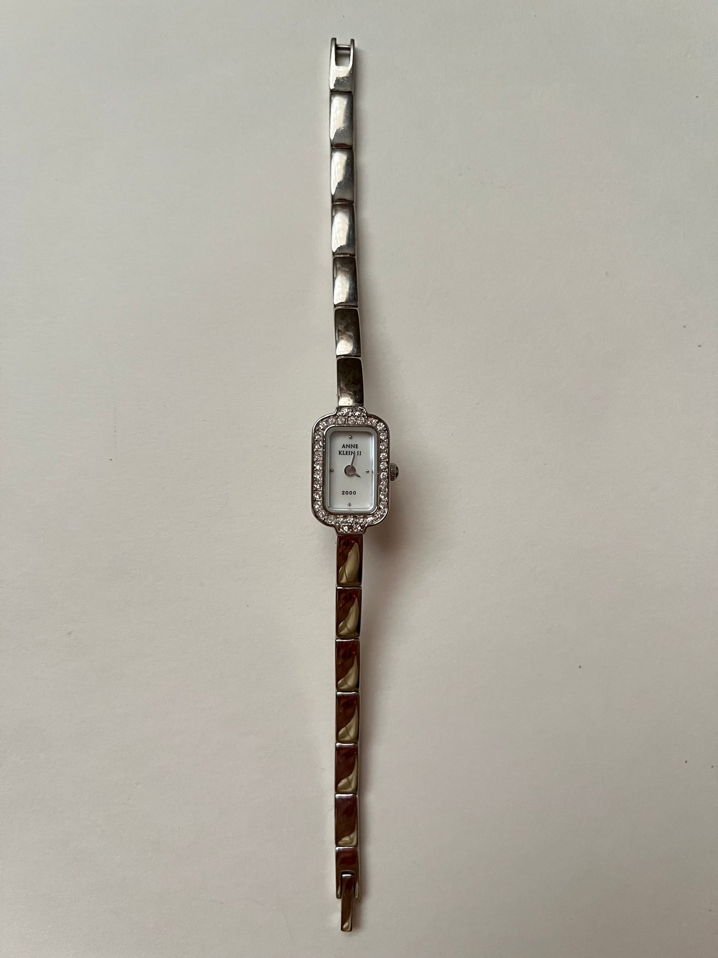Lovely Dainty Silver Tone Anne Klein Watch with Crystal-Accented Rectangular Bezel
