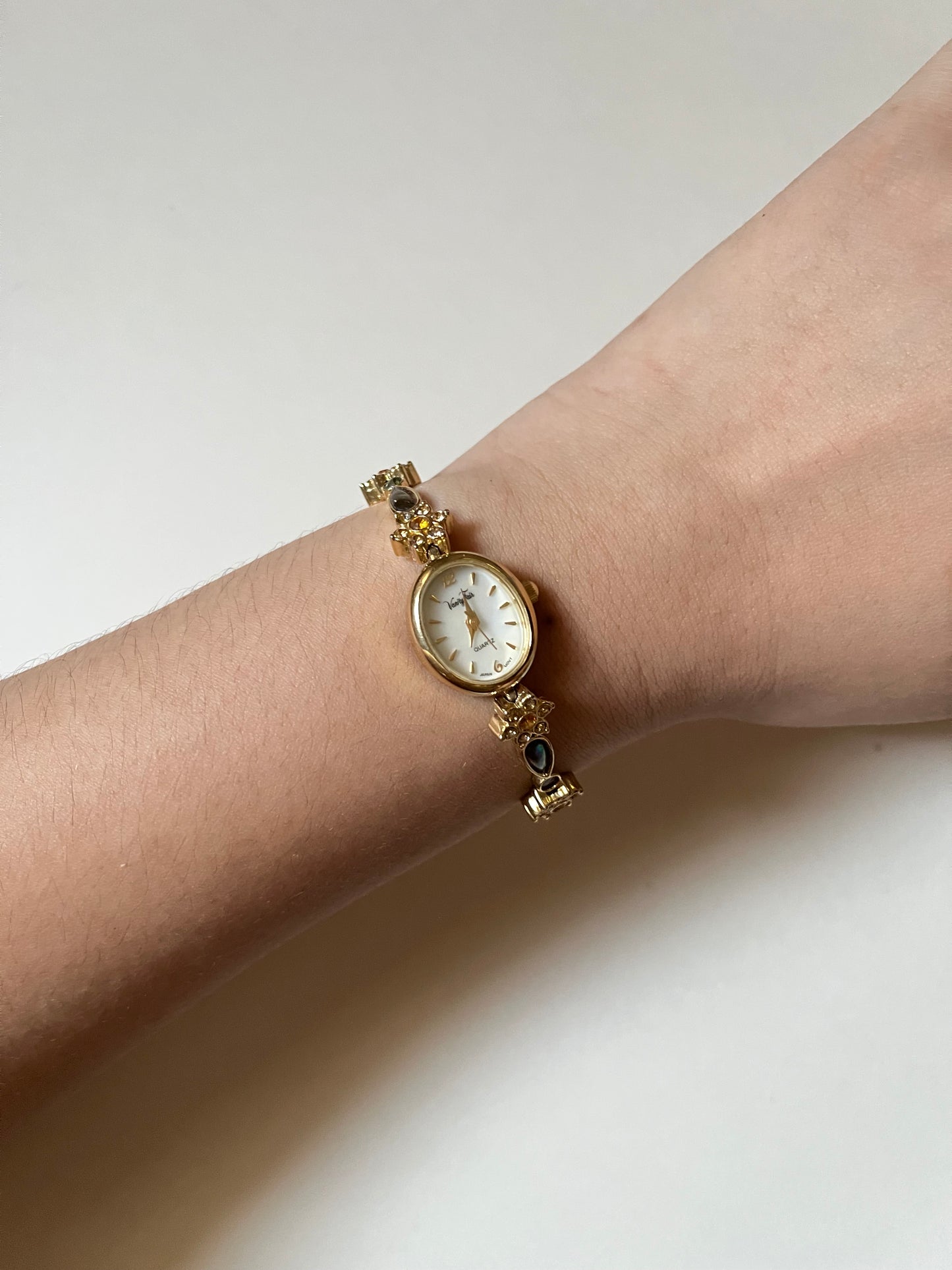 Beautiful and Dainty Gold Tone Watch with Abalone and Rhinestones Accents