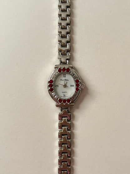 Beautiful Silver Tone Watch with Oval Dial and Gorgeous Red Gems Accent