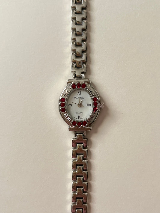Beautiful Silver Tone Watch with Oval Dial and Gorgeous Red Gems Accent