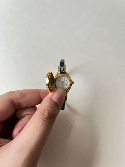 Beautiful Gold Tone Open Cuff Peekaboo Swiss Watch with Navy Blue Floral Enameled Bracelet