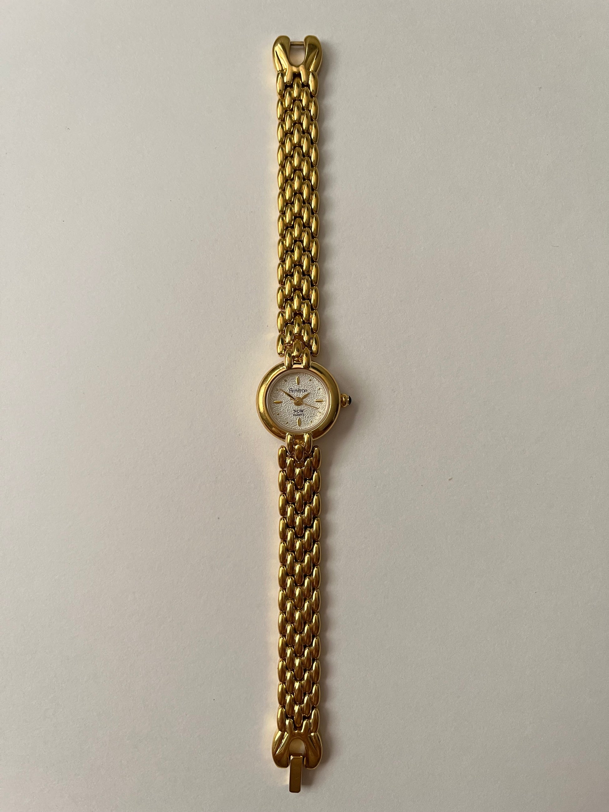 Beautiful Gold Tone Watch with Dainty Round Textured Dial