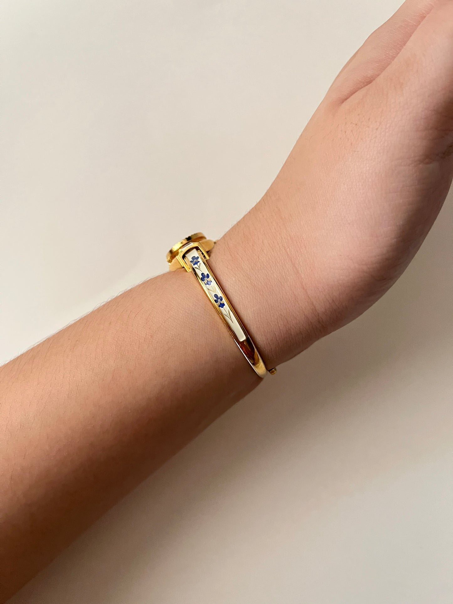 Beautiful Gold Tone Open Cuff Peekaboo Swiss Watch with Navy Floral Enameled Bracelet