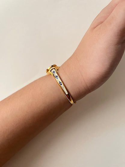 Beautiful Gold Tone Open Cuff Peekaboo Swiss Watch with Navy Floral Enameled Bracelet