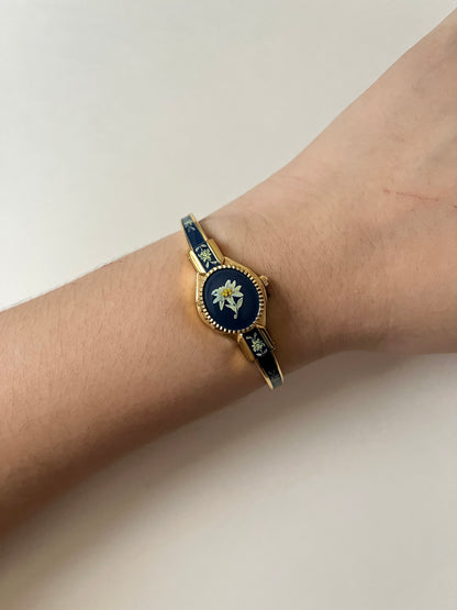 Beautiful Gold Tone Open Cuff Peekaboo Swiss Watch with Navy Blue Floral Enameled Bracelet