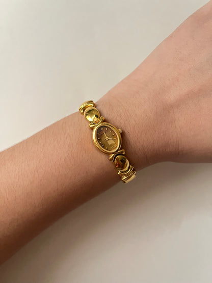 Stunning Gold Tone Pulsar Watch with Oval Dial