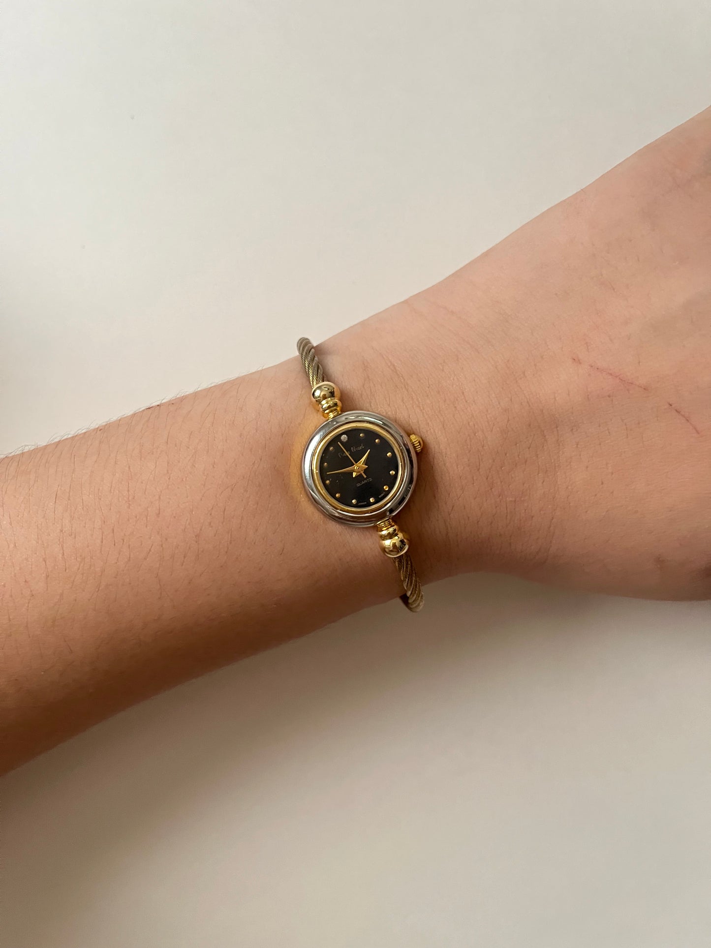 Gold Tone Open Cuff Watch with Interchangeable Bezels