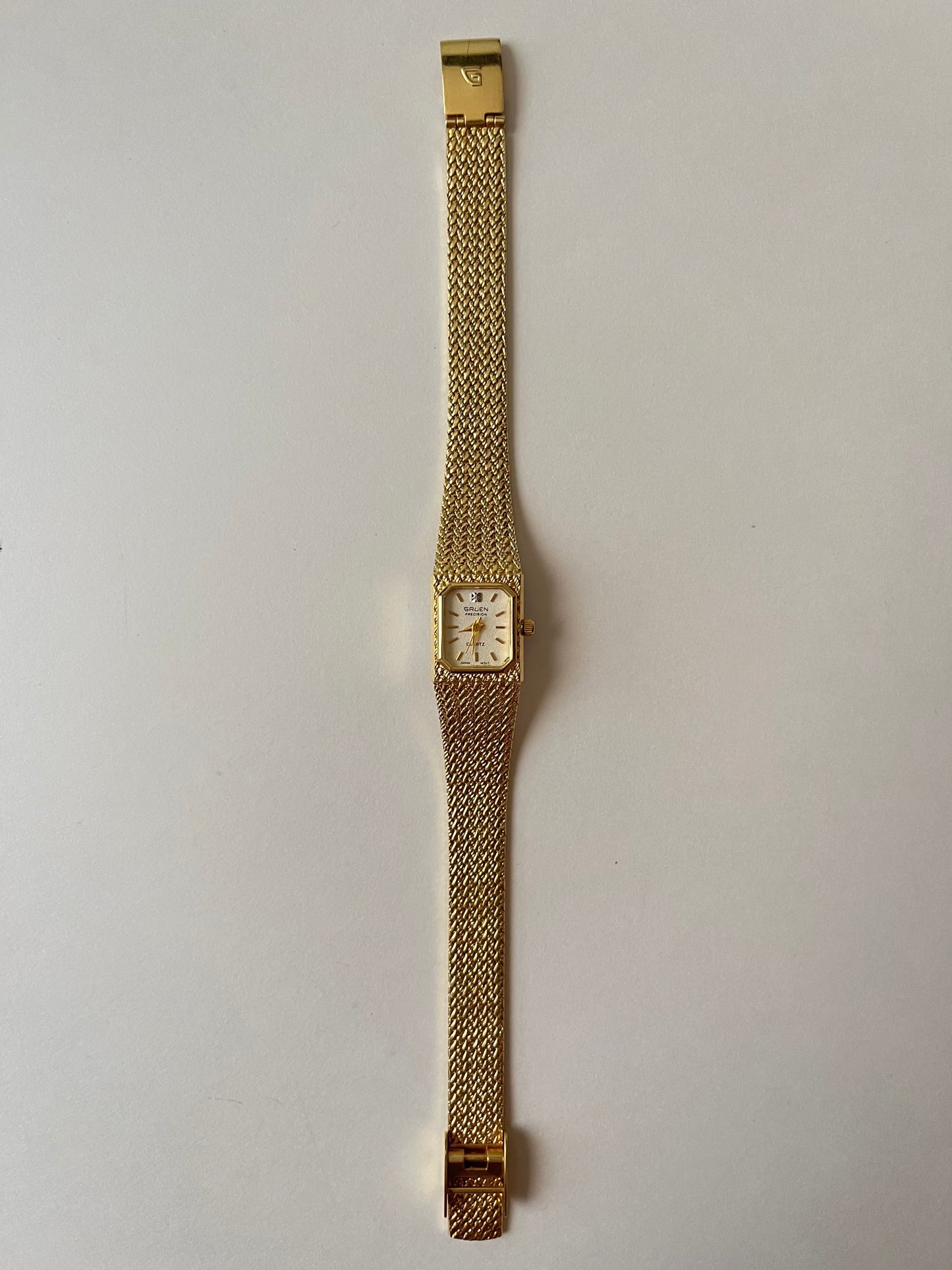 Very Chic and Classy Gold Tone Cocktail Watch with Dainty Rectangular Dial