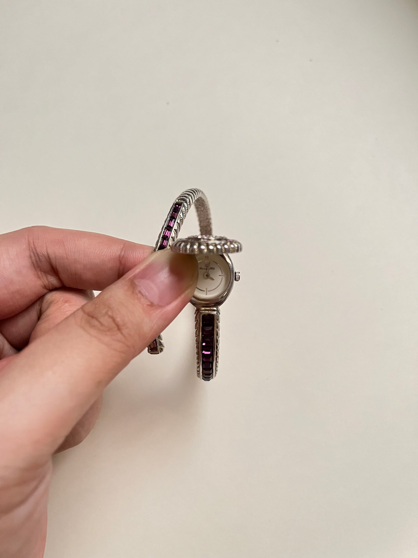 Very Unique Silver Tone Peekaboo Open Cuff Watch with Purple Stones Accent
