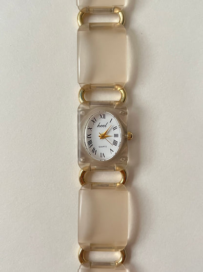 Adorable Gold Tone Acrylic Watch with Oval Dial