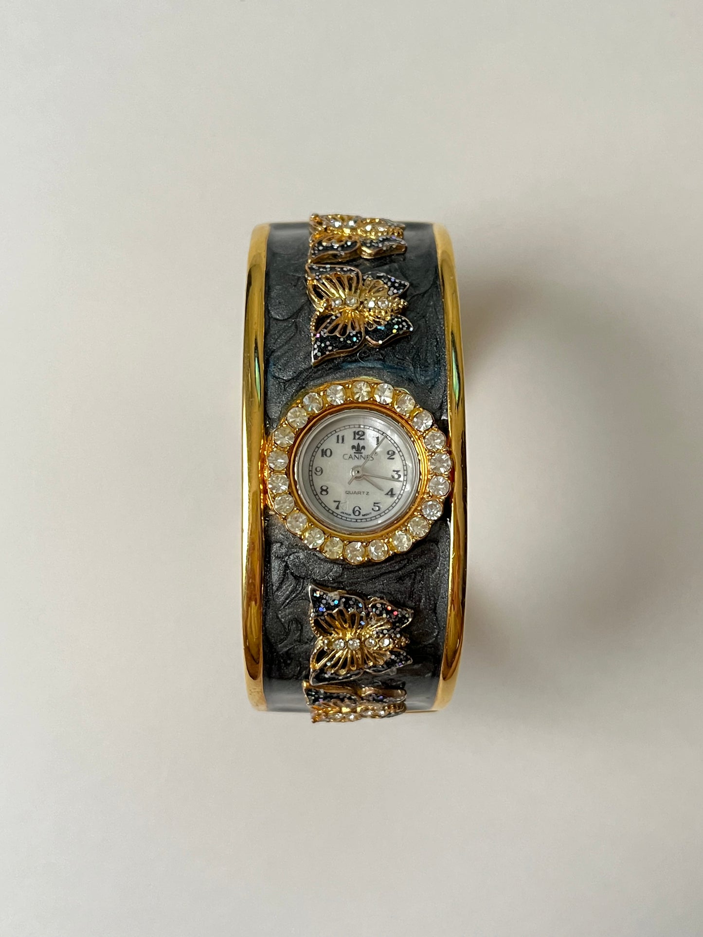 Absolutely Amazing Gold Tone Cuff Watch with Butterflies Accent