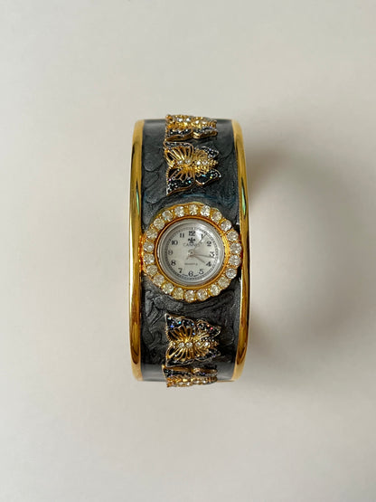 Absolutely Amazing Gold Tone Cuff Watch with Butterflies Accent