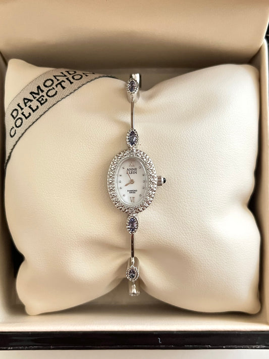 Very Dainty Silver Tone Swiss Watch with Real Diamond and Light Purple Stone Accents