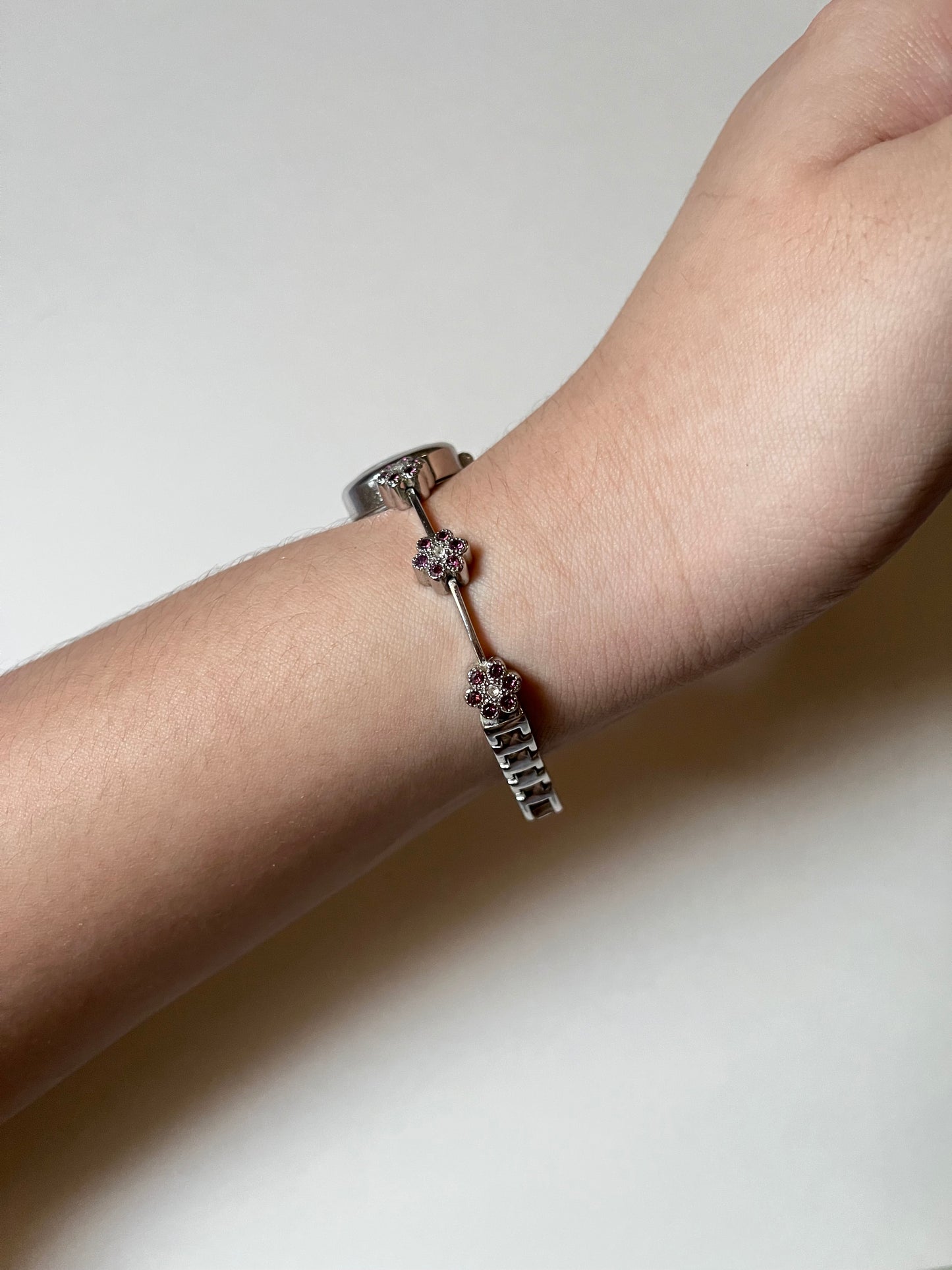 Cute and Dainty Silver Tone Anne Klein Watch with Purple Flower Rhinestones Accent