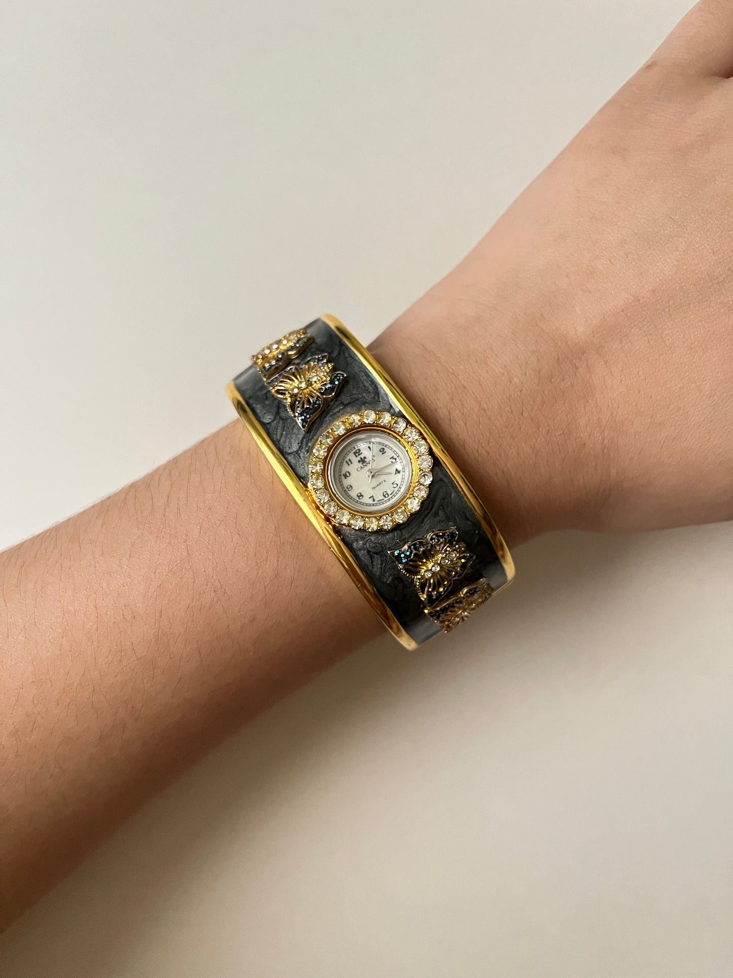 Absolutely Amazing Gold Tone Cuff Watch with Butterflies Accent