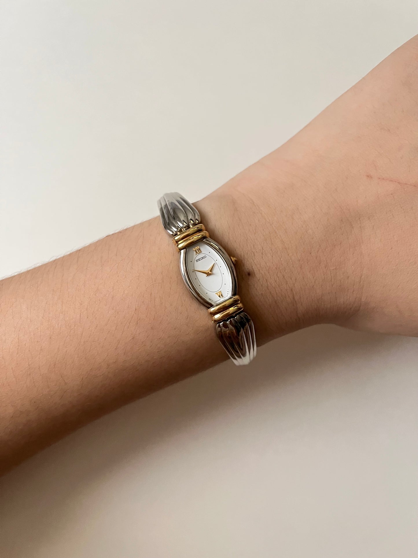 Art Deco Style Two Toned Seiko Half Cuff Watch with Oval Dial