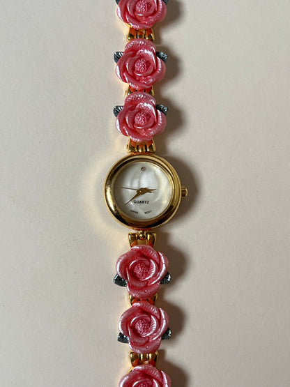 Pretty Gold Tone Watch with Round Dial and Pink Rose Links
