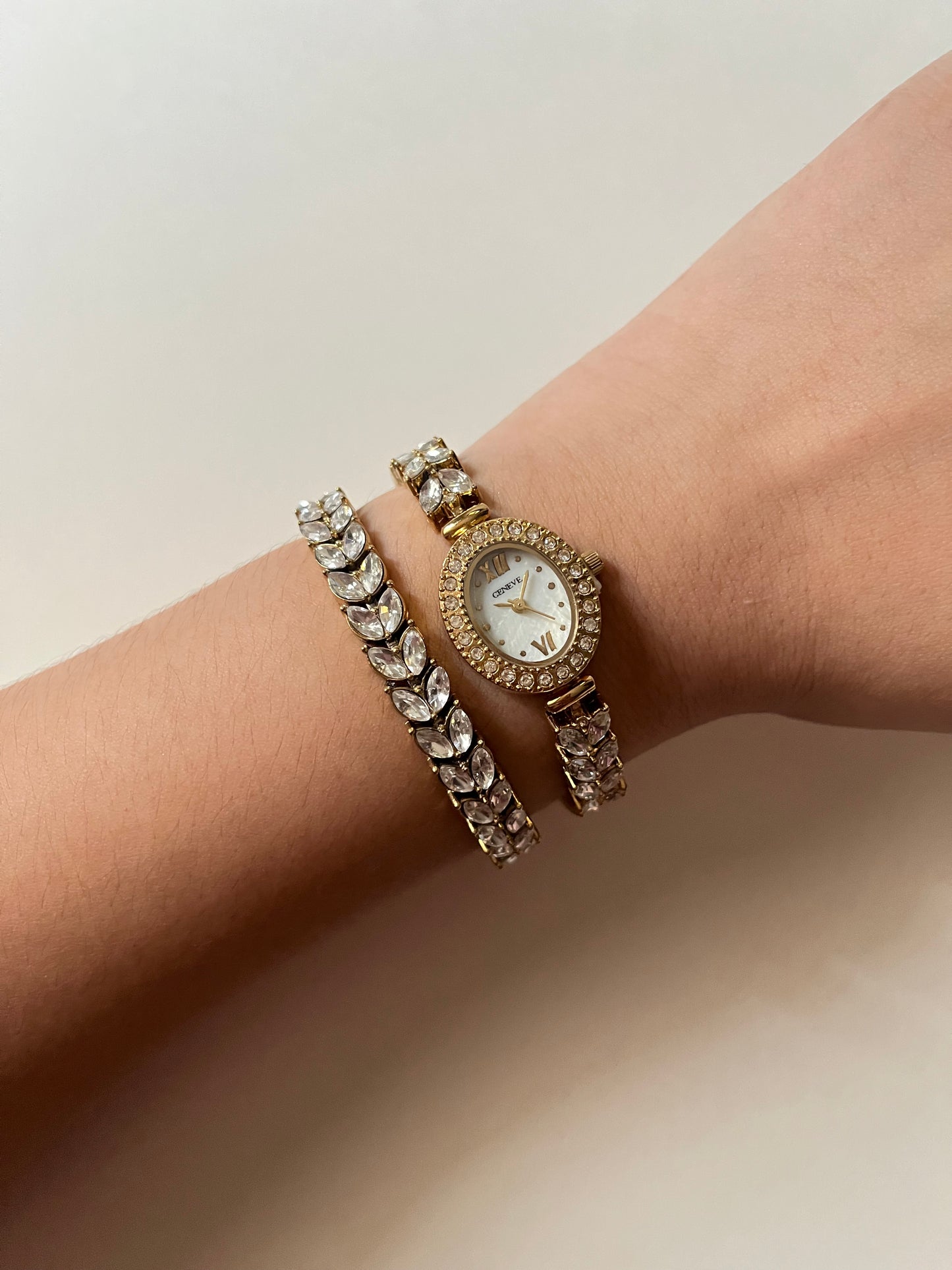 Astonishing Gold Tone Watch and Bracelet Set with Marquise Cut Gem Encrusted Band