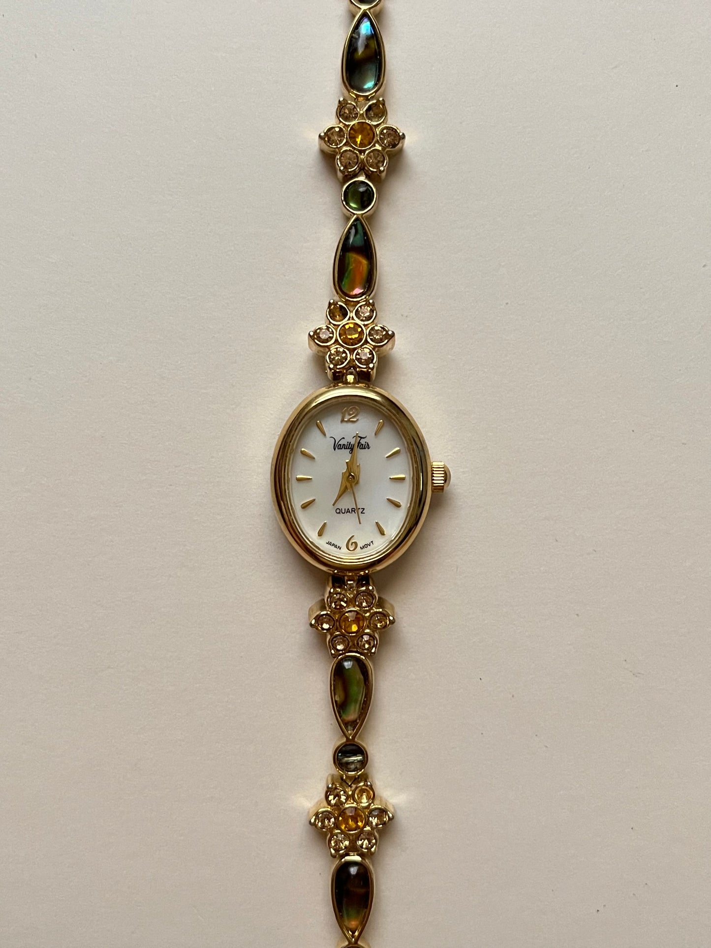 Beautiful and Dainty Gold Tone Watch with Abalone and Rhinestones Accents