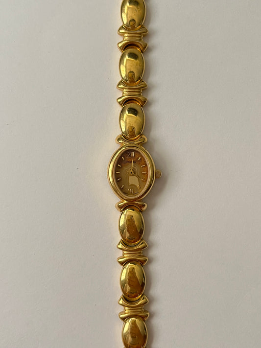 Stunning Gold Tone Pulsar Watch with Oval Dial